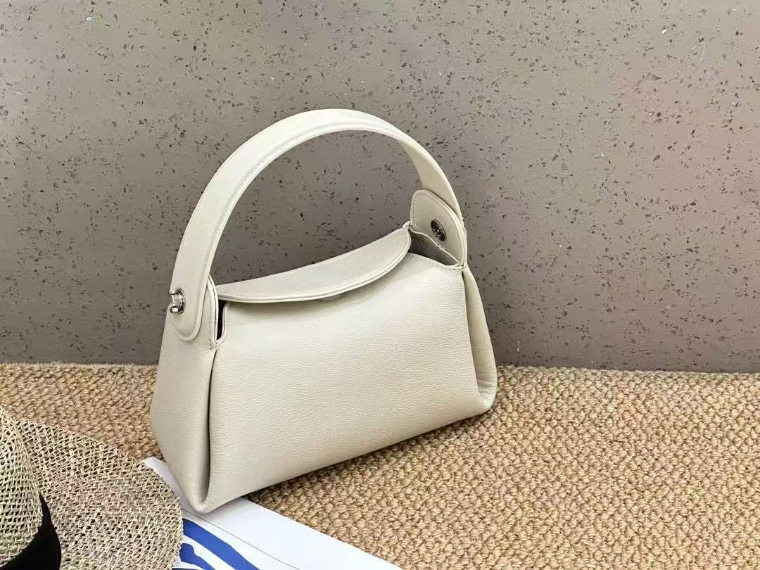 Small handbag of cigarette box type