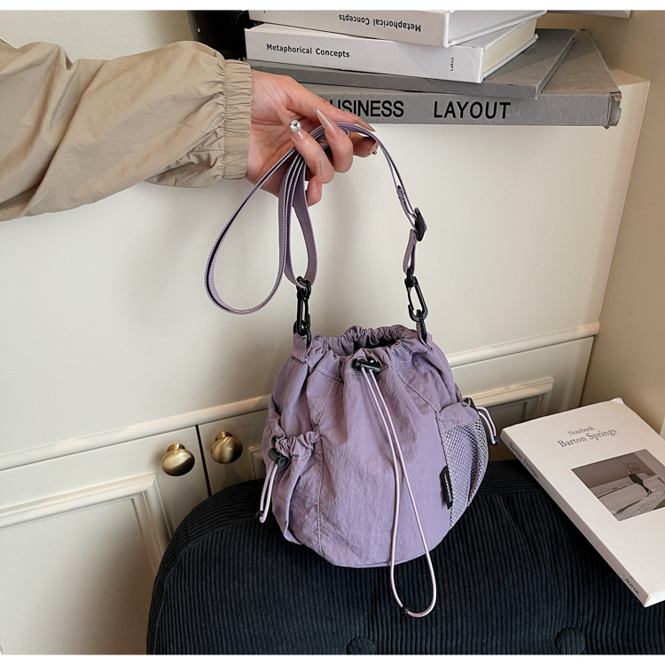 Lightweight and casual crossbody bag drawstring opening