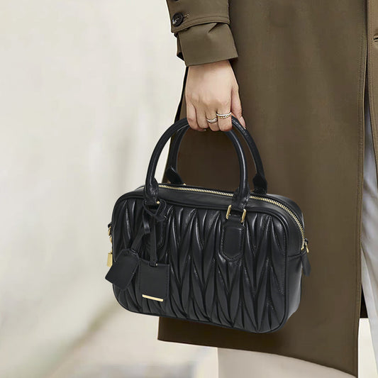 Sheepskin pleated bowling ball hand-held crossbody bag