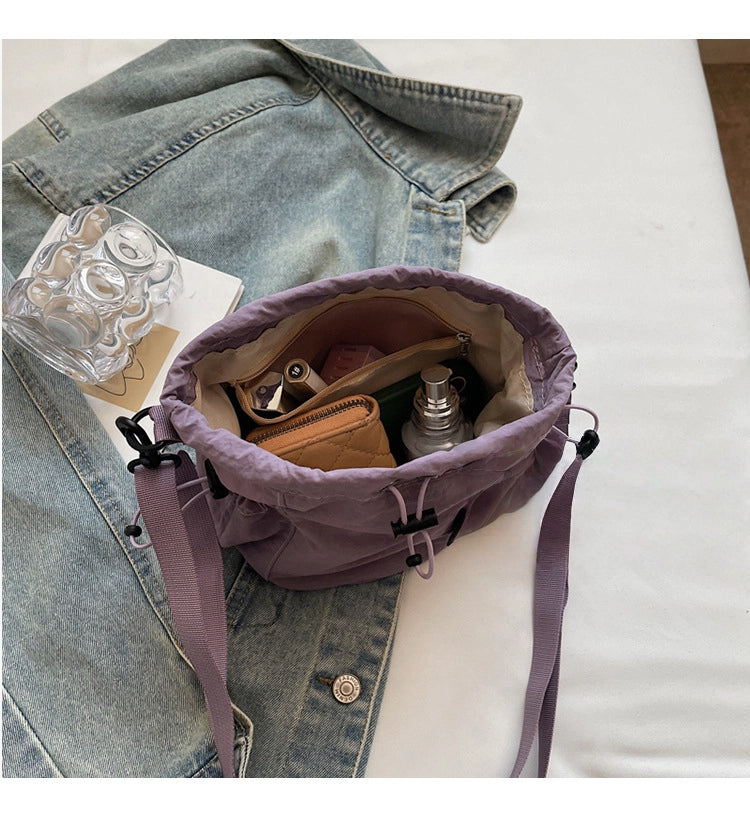 Lightweight and casual crossbody bag drawstring opening