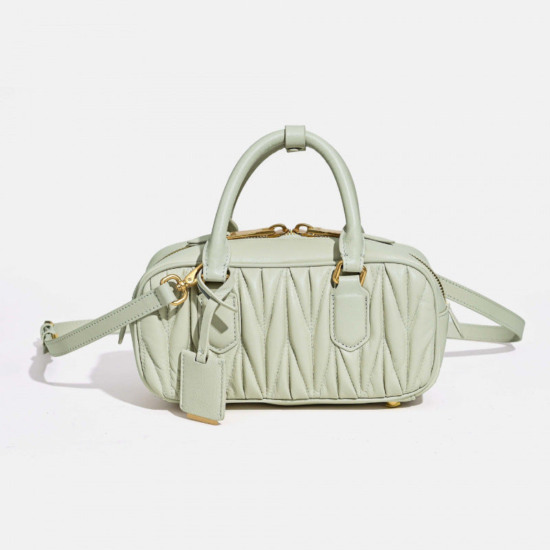 Sheepskin pleated bowling ball hand-held crossbody bag