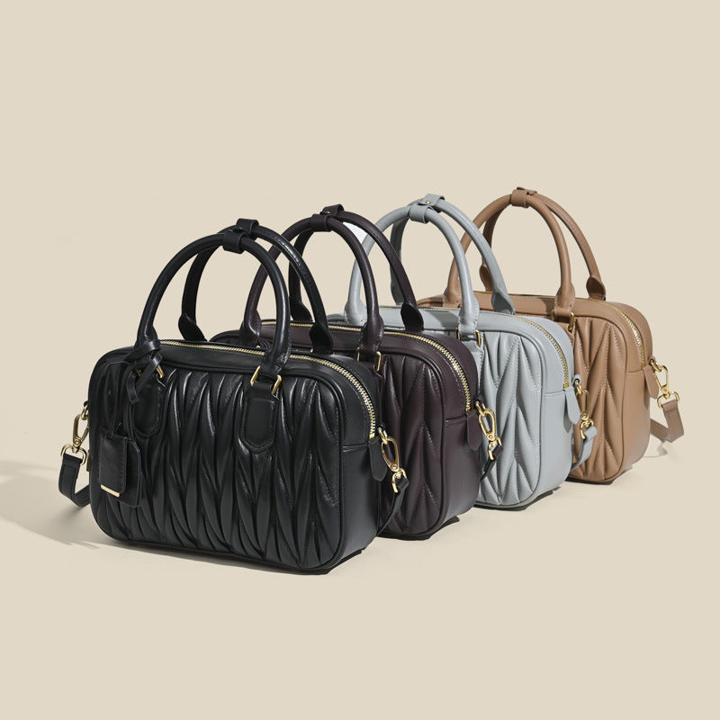 Sheepskin pleated bowling ball hand-held crossbody bag