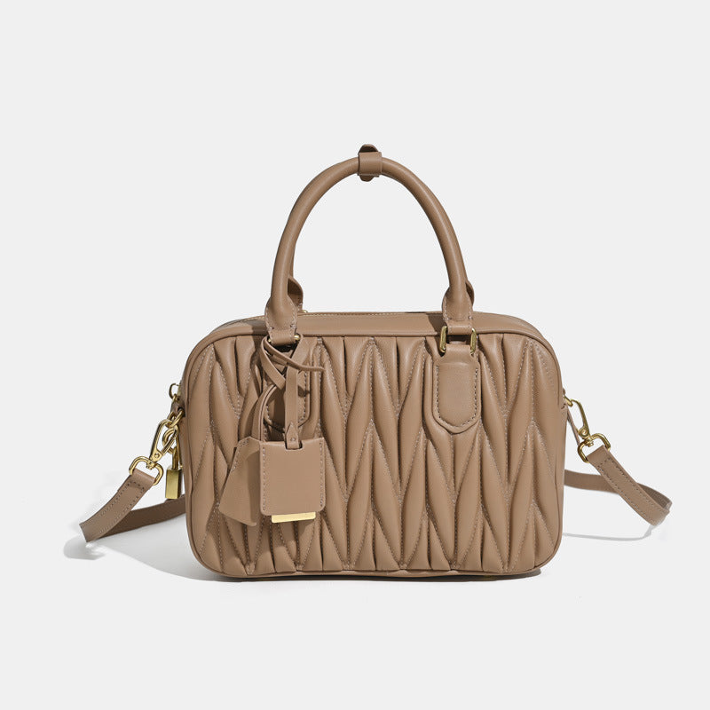 Sheepskin pleated bowling ball hand-held crossbody bag