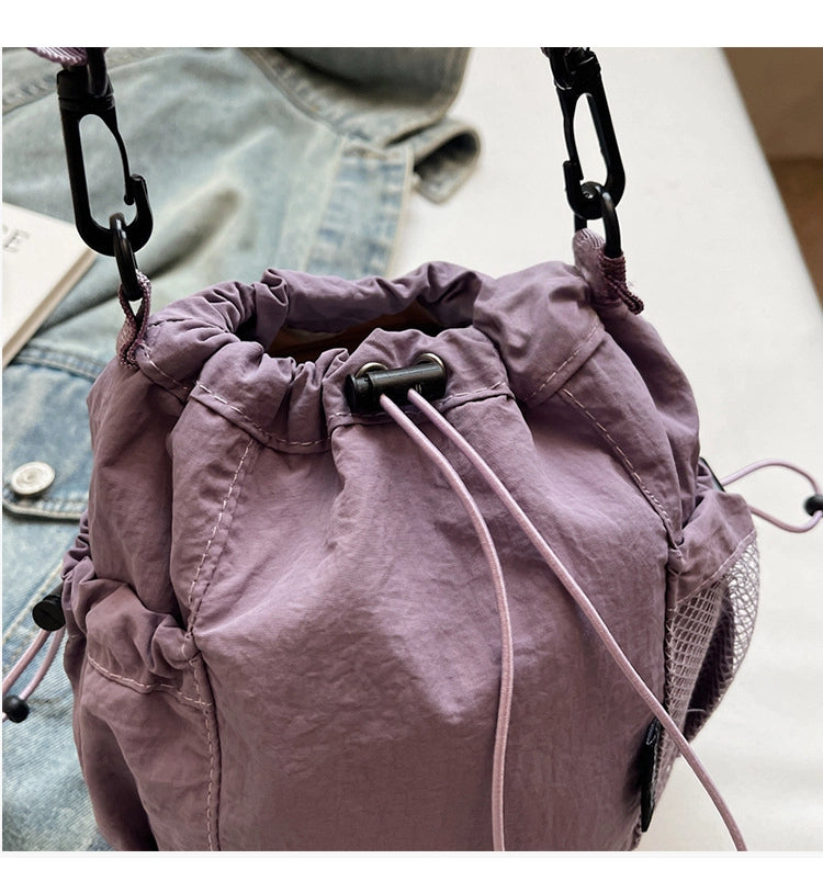 Lightweight and casual crossbody bag drawstring opening