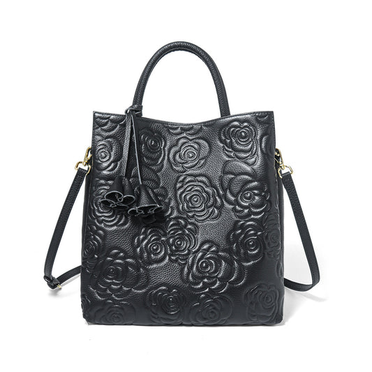 Camellia embossed tassel cowhide crossbody bag