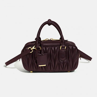 Sheepskin pleated bowling ball hand-held crossbody bag