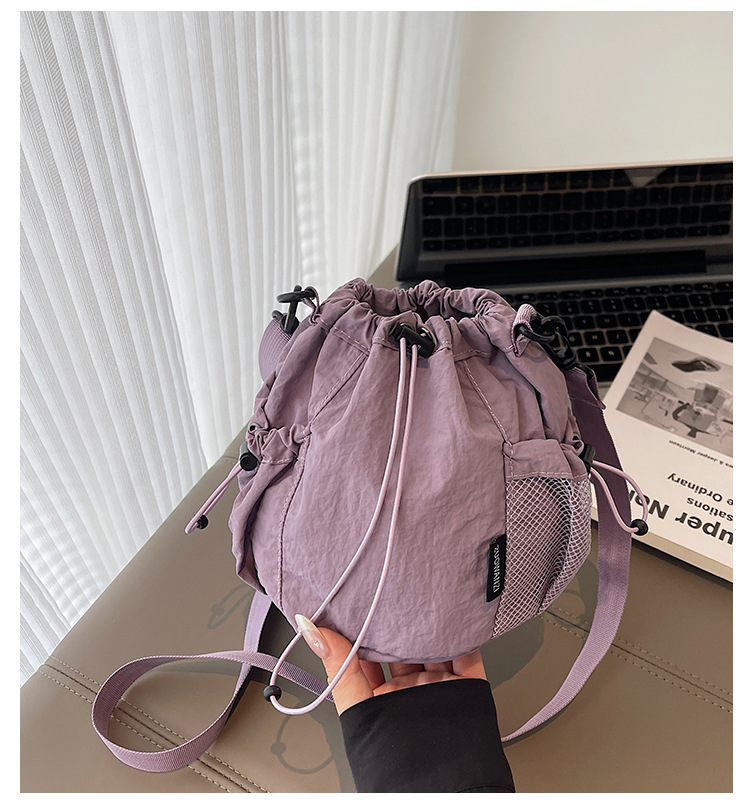 Lightweight and casual crossbody bag drawstring opening