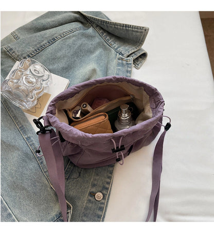 Lightweight and casual crossbody bag drawstring opening