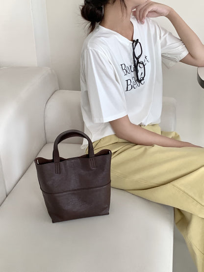 Soft leather crossbody bucket bag