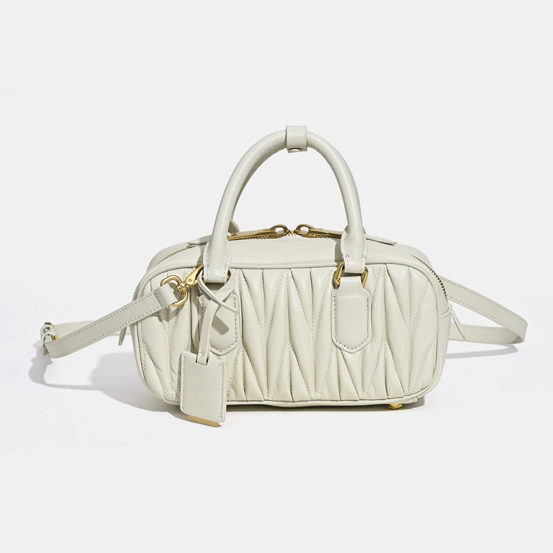 Sheepskin pleated bowling ball hand-held crossbody bag