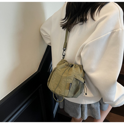 Lightweight and casual crossbody bag drawstring opening