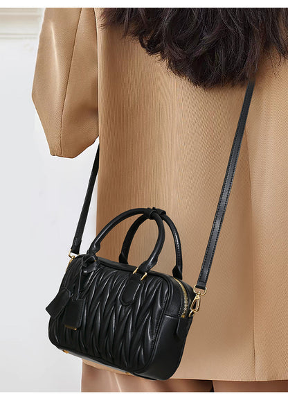 Sheepskin pleated bowling ball hand-held crossbody bag