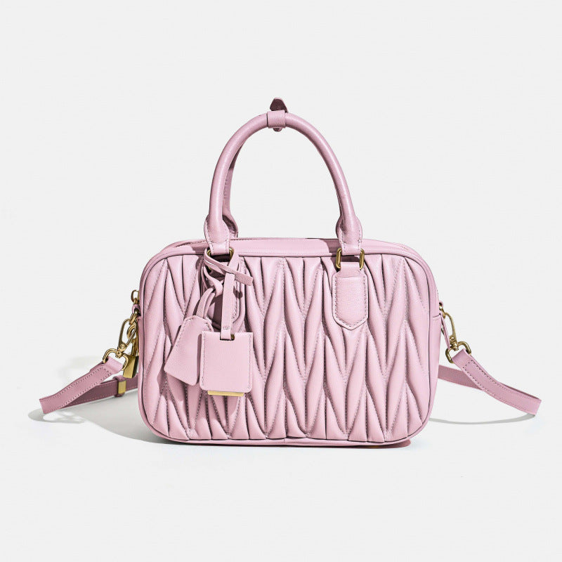 Sheepskin pleated bowling ball hand-held crossbody bag