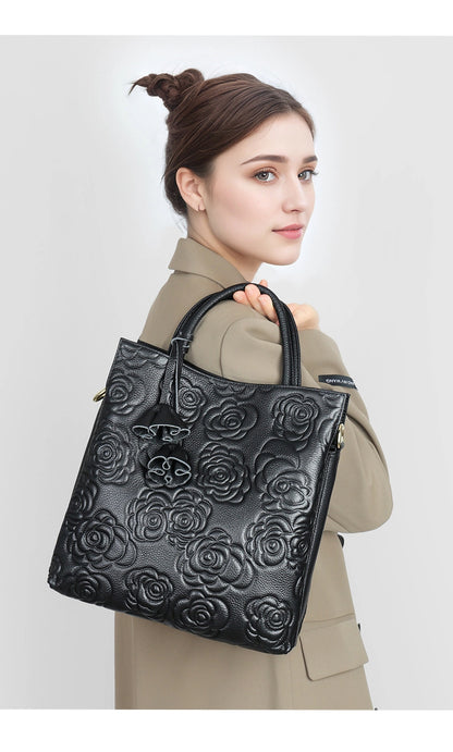 Camellia embossed tassel cowhide crossbody bag