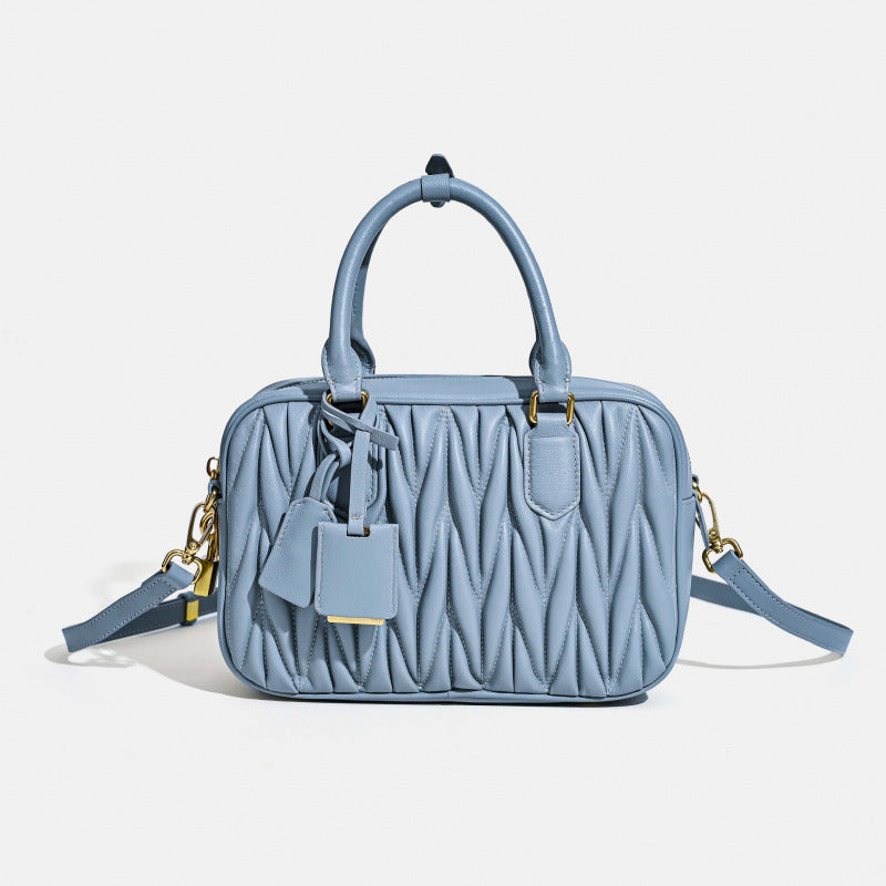 Sheepskin pleated bowling ball hand-held crossbody bag