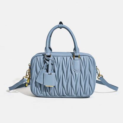 Sheepskin pleated bowling ball hand-held crossbody bag