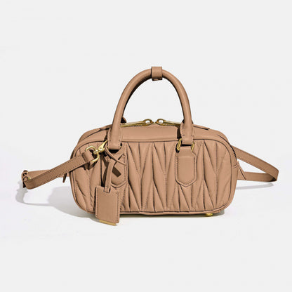 Sheepskin pleated bowling ball hand-held crossbody bag