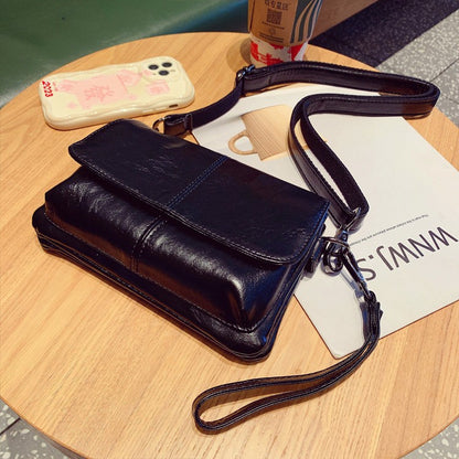 Solid-color retro cowhide grain crossbody bag