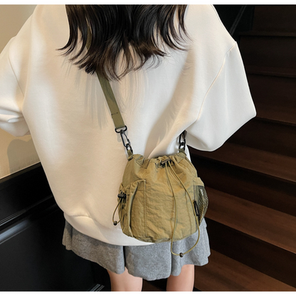 Lightweight and casual crossbody bag drawstring opening