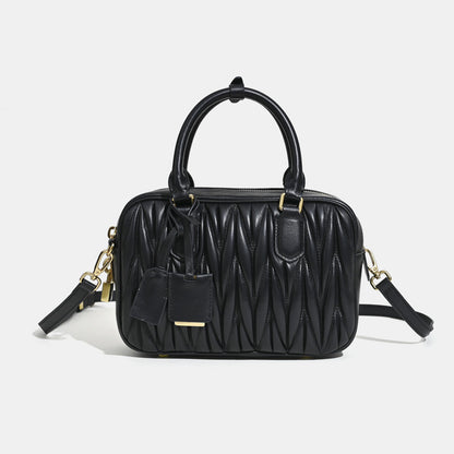 Sheepskin pleated bowling ball hand-held crossbody bag