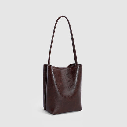 Fashionable suction button simple one shoulder bag