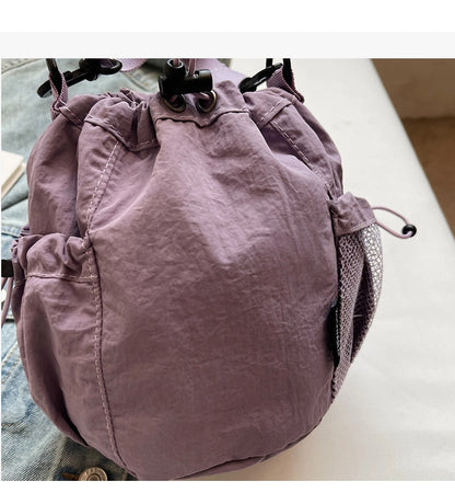 Lightweight and casual crossbody bag drawstring opening