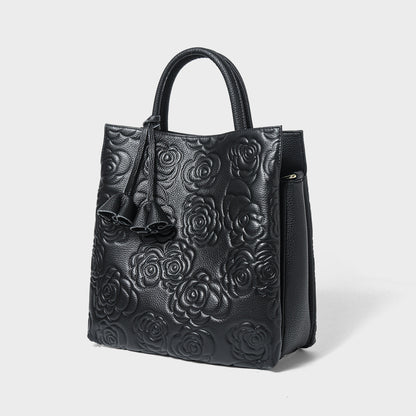 Camellia embossed tassel cowhide crossbody bag