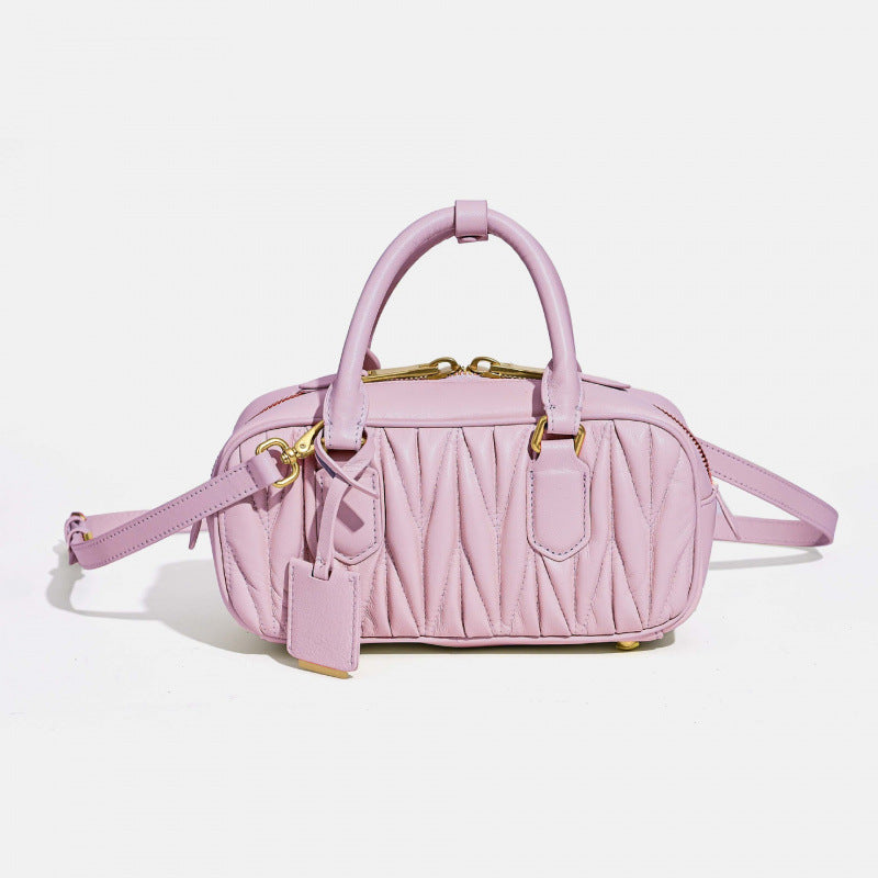 Sheepskin pleated bowling ball hand-held crossbody bag