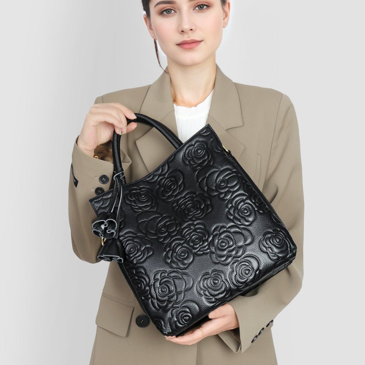 Camellia embossed tassel cowhide crossbody bag - zoraflux