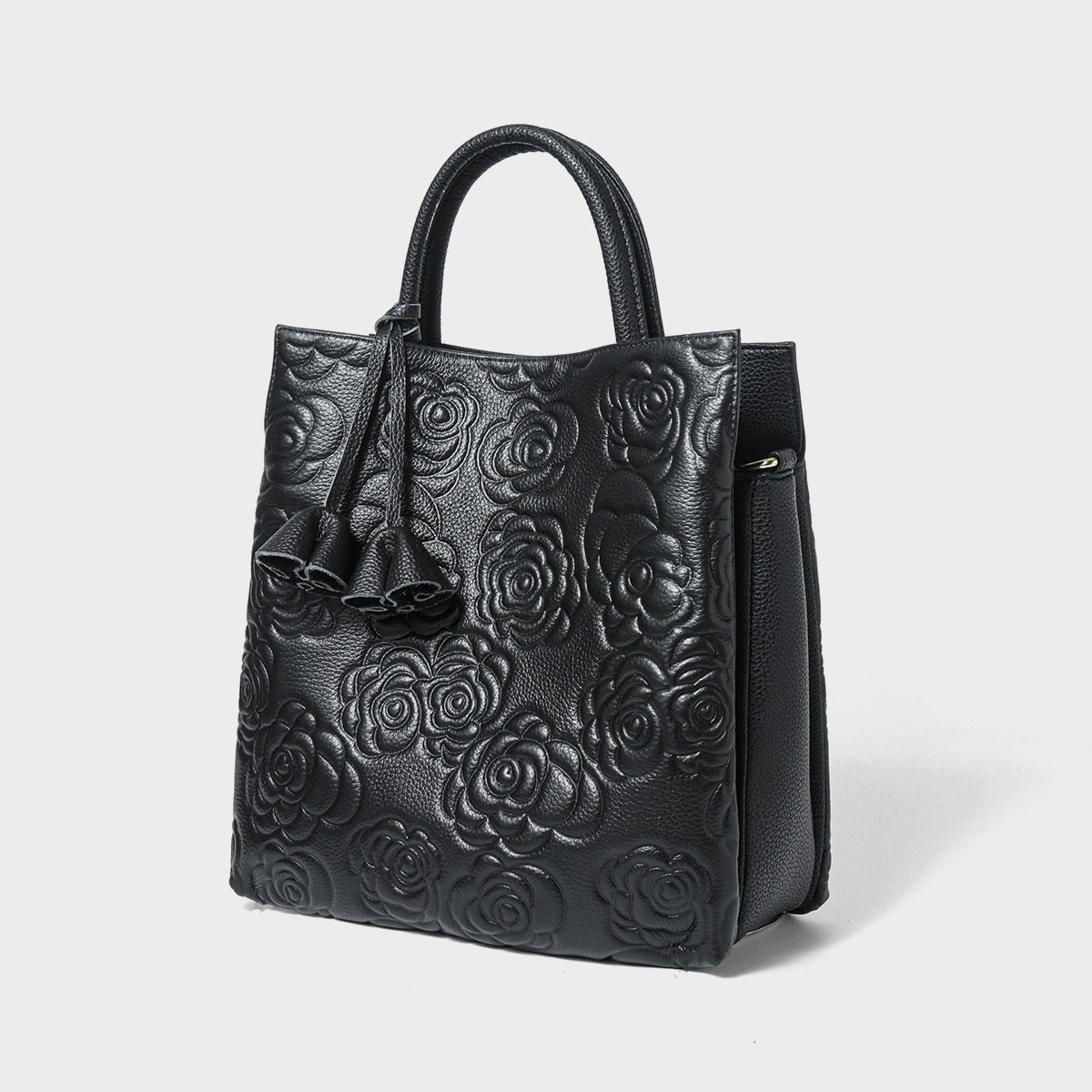 Camellia embossed tassel cowhide crossbody bag - zoraflux