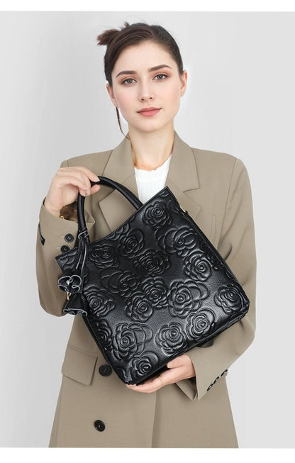 Camellia embossed tassel cowhide crossbody bag - zoraflux