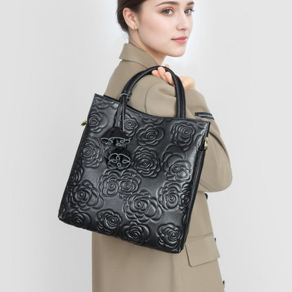 Camellia embossed tassel cowhide crossbody bag - zoraflux