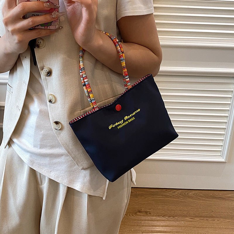 Cute and versatile portable handbag - zoraflux