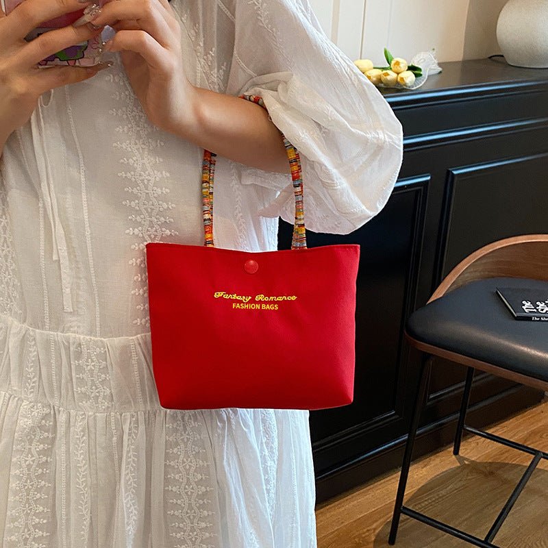 Cute and versatile portable handbag - zoraflux