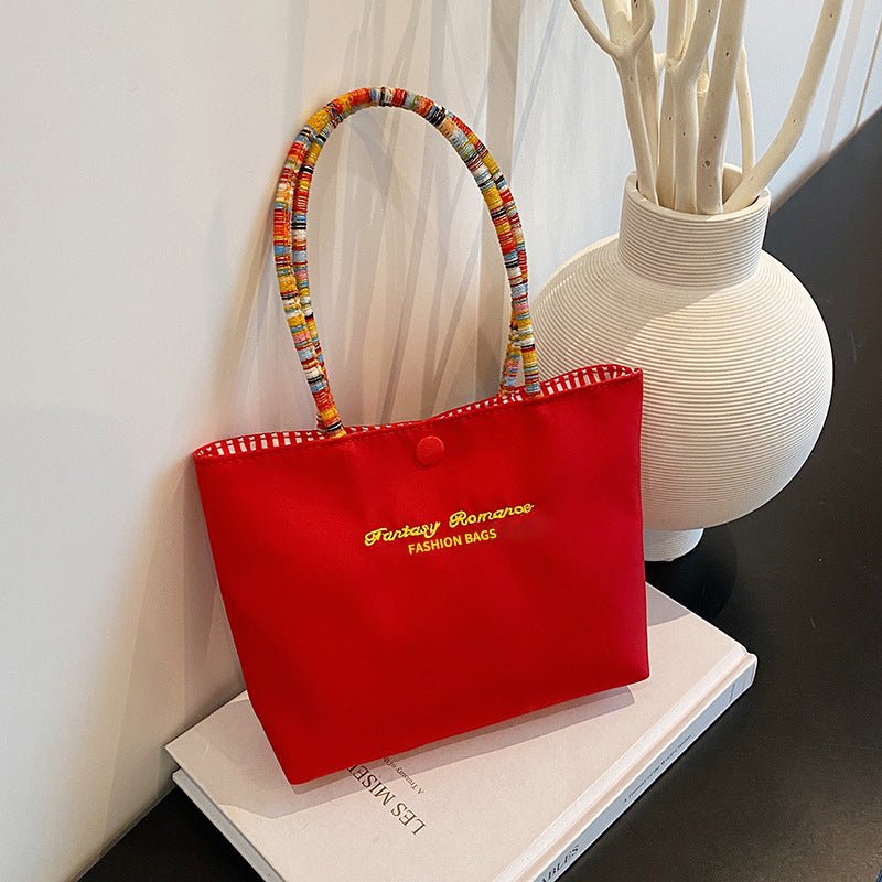 Cute and versatile portable handbag - zoraflux