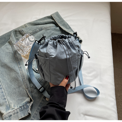 Lightweight and casual crossbody bag drawstring opening