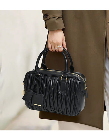 Sheepskin pleated bowling ball hand-held crossbody bag