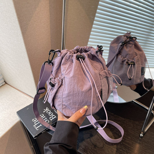 Lightweight and casual crossbody bag drawstring opening