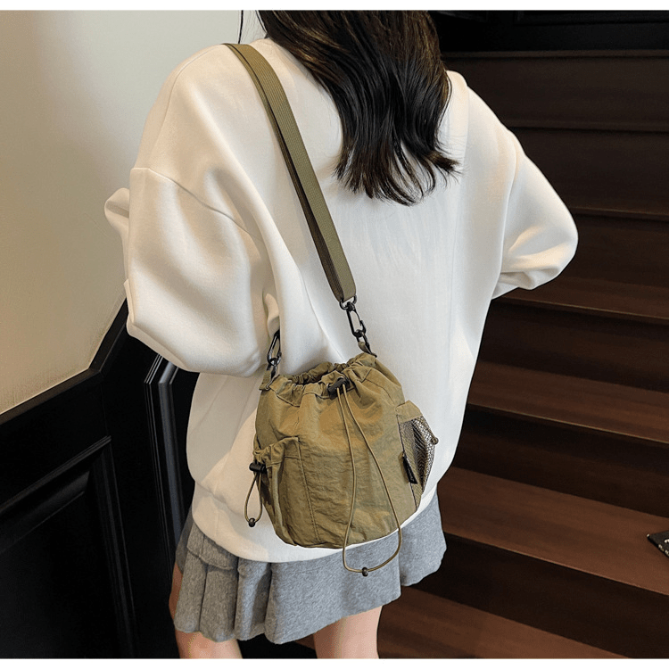 Lightweight and casual crossbody bag drawstring opening - zoraflux