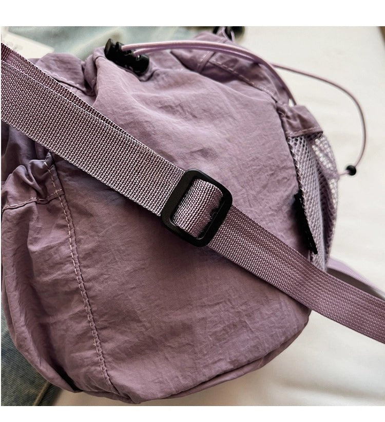 Lightweight and casual crossbody bag drawstring opening - zoraflux