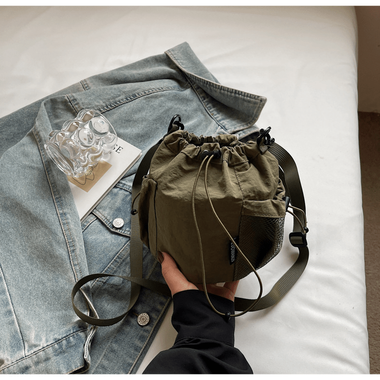 Lightweight and casual crossbody bag drawstring opening - zoraflux