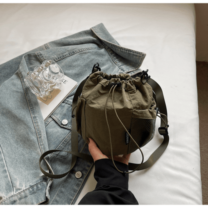 Lightweight and casual crossbody bag drawstring opening - zoraflux