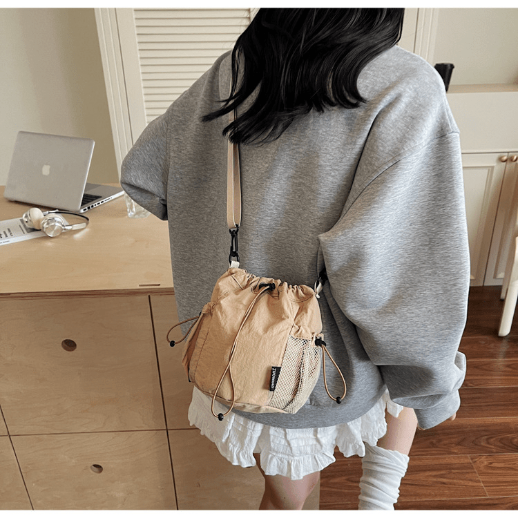 Lightweight and casual crossbody bag drawstring opening - zoraflux