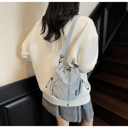Lightweight and casual crossbody bag drawstring opening - zoraflux