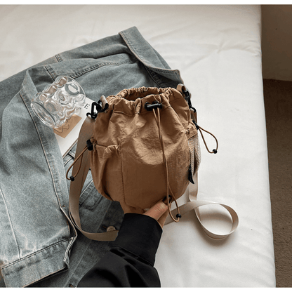 Lightweight and casual crossbody bag drawstring opening - zoraflux