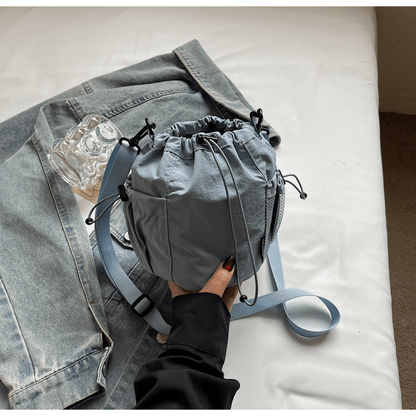 Lightweight and casual crossbody bag drawstring opening - zoraflux