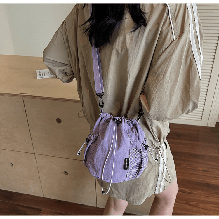 Lightweight and casual crossbody bag drawstring opening - zoraflux