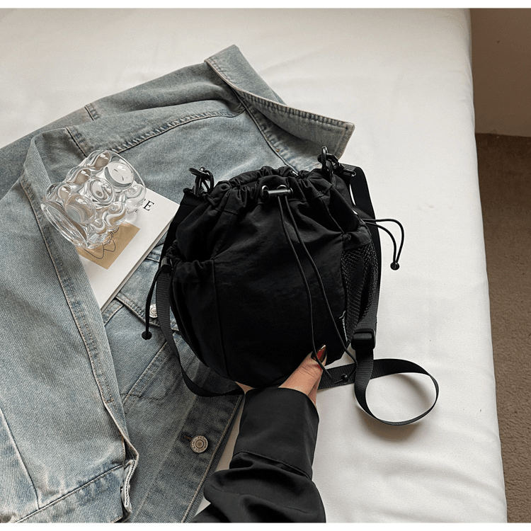 Lightweight and casual crossbody bag drawstring opening - zoraflux