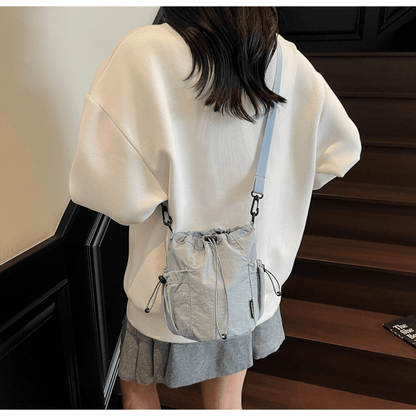 Lightweight and casual crossbody bag drawstring opening - zoraflux