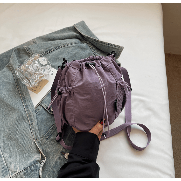 Lightweight and casual crossbody bag drawstring opening - zoraflux